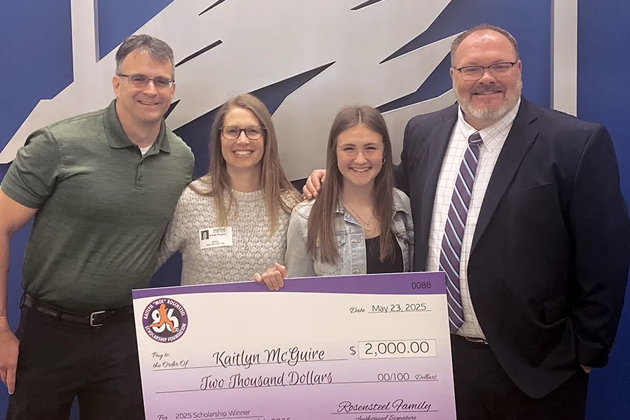 Kaitlyn McGuire 2-25 Scholarship Winner Kaitlyn McGuire with parents and Ed Rosensteel holding Scholarship Check