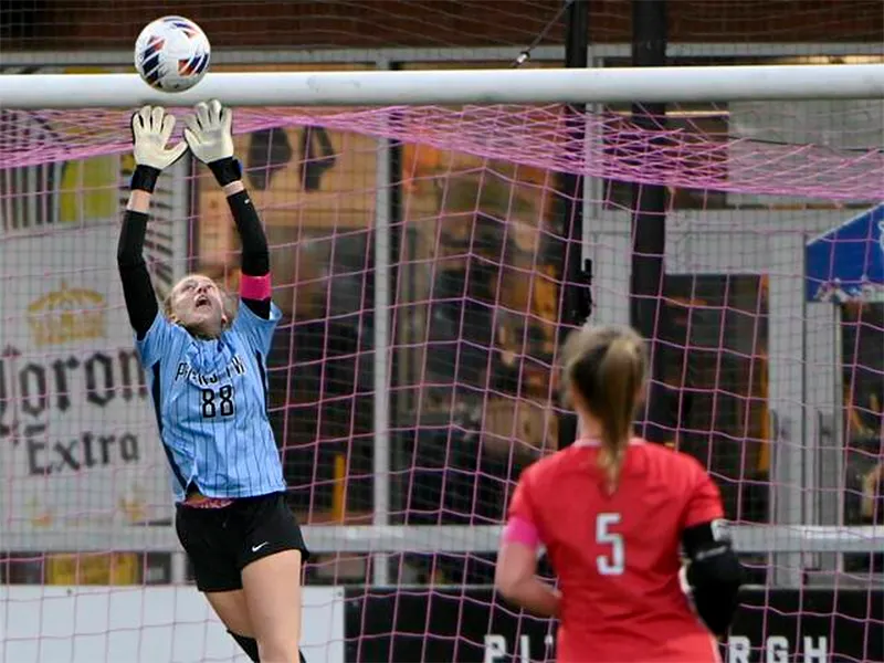 Molly Kubisteck in action goal-tending